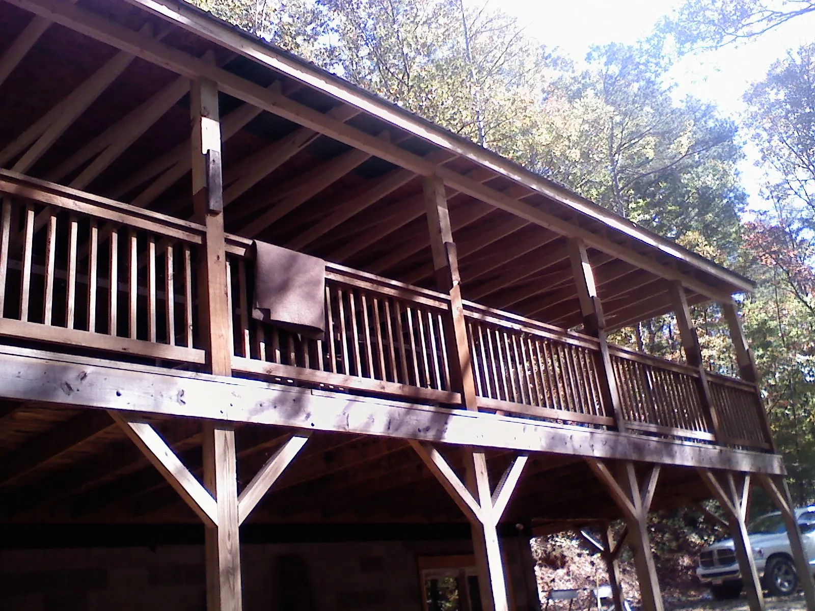 Timber framing under a new elevated porch and deck — Roof Leak Repair in Rufus by Roofing Brothers